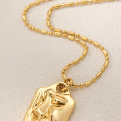 Loki Pendant Necklace - 18K Gold-Plated Brass Sleeping Beauty Face Charm - Enchanting Jewelry Profile Picture