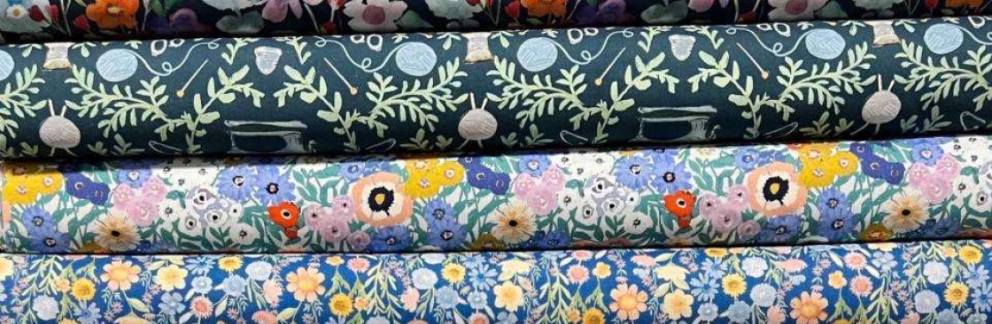 Fabrics By The Creek Cover Image