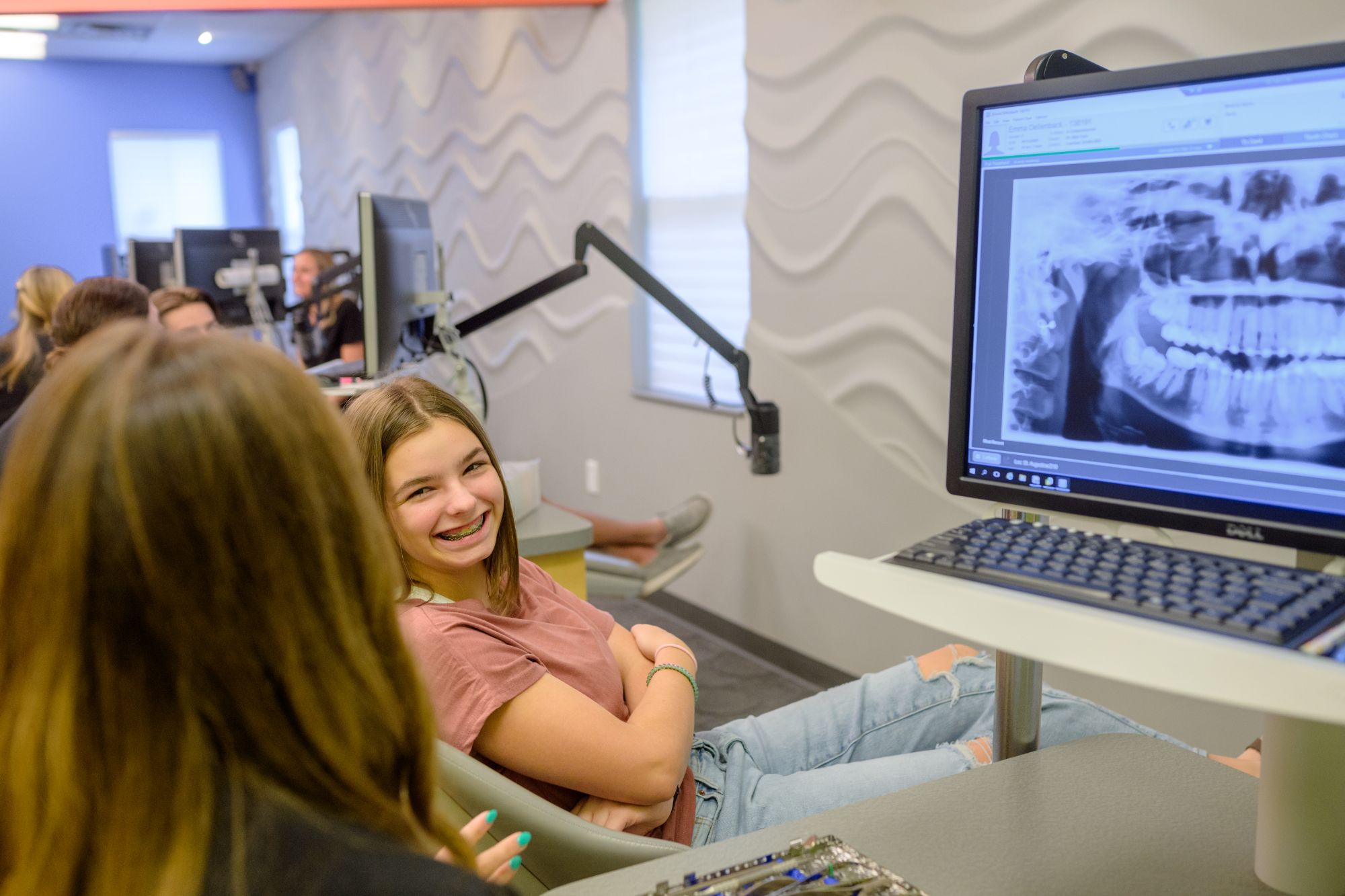 About Us - Ossi Orthodontics - Dr. Ossi