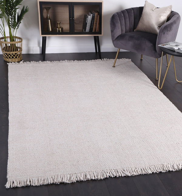 Layering Rugs: Using an Extra-Large Base Rug to Anchor Your Room - Article victory
